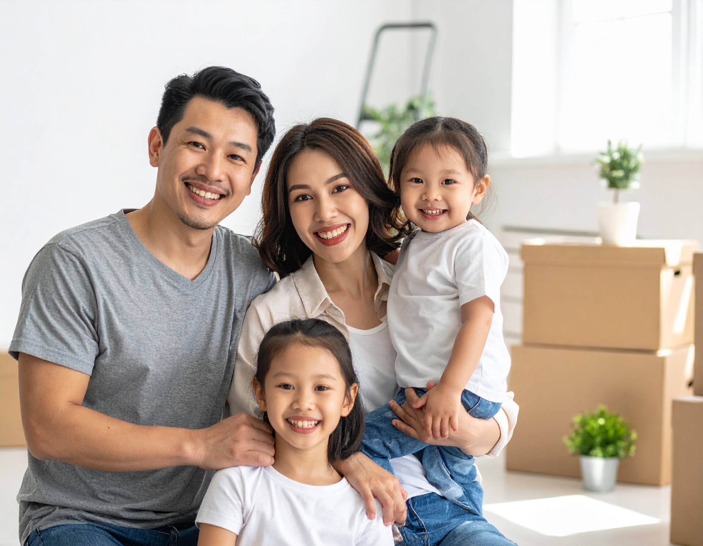 Happy family in a staged living room